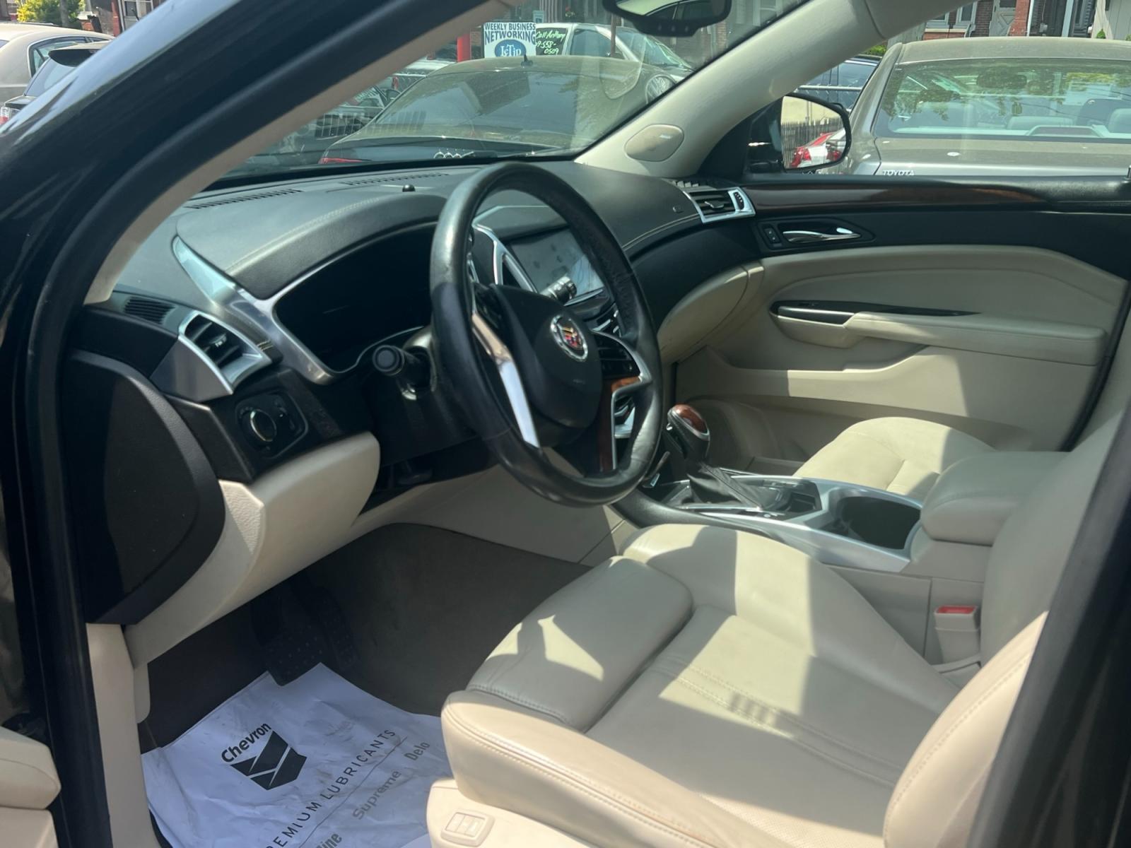 2013 BLACK /Beige leather Cadillac SRX (3GYFNGE37DS) , located at 1018 Brunswick Ave, Trenton, NJ, 08638, (609) 989-0900, 40.240086, -74.748085 - Can you say "Brand New" because that is exactly what this vehicle is.. Brand new in every way with only 29k Miles on it!! A must see in every way! - Photo #12